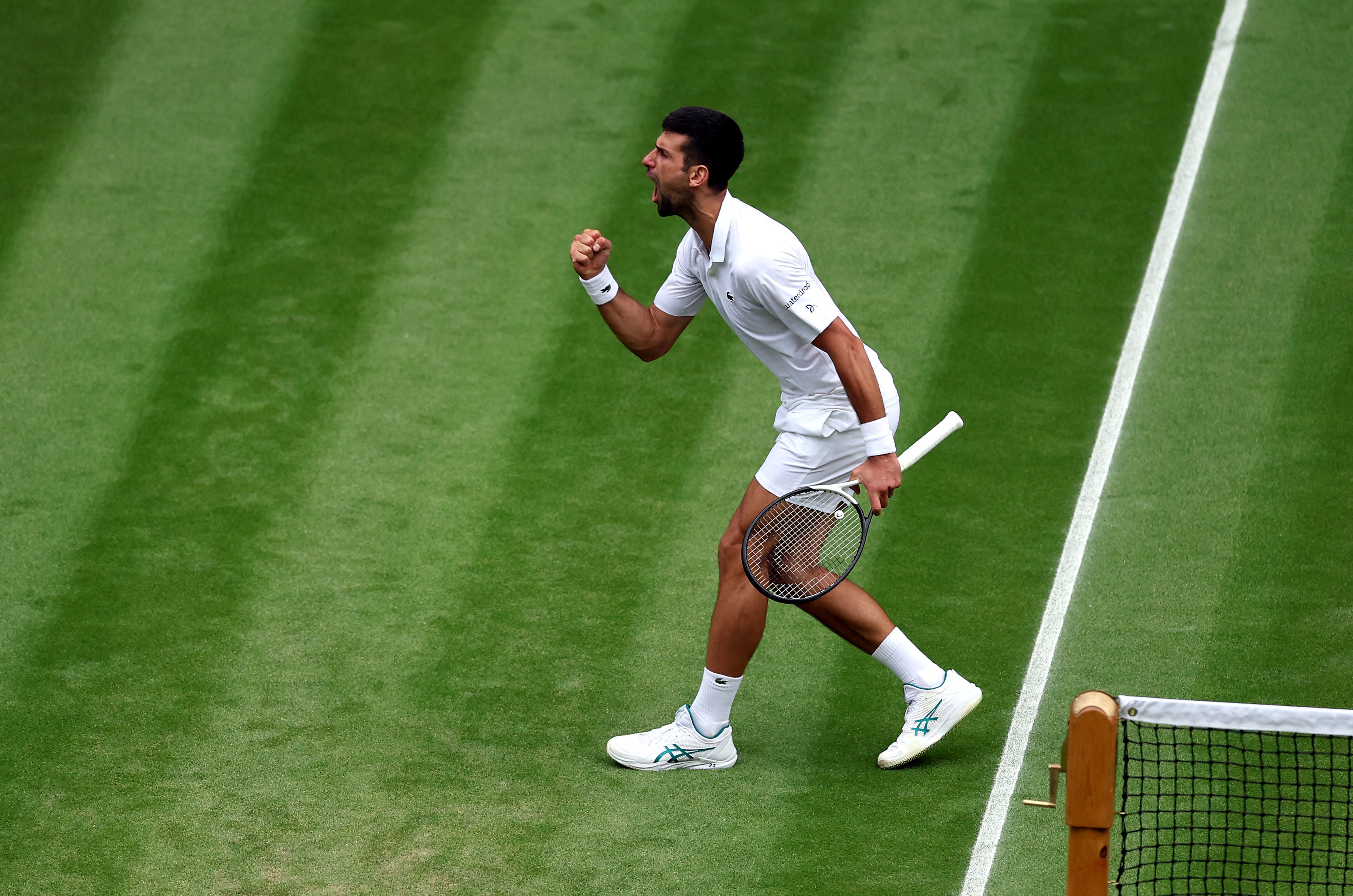 A fired-up Djokovic battles to win the third set against Rublev
