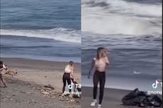 Influencer exposed for filming her beach clean-up and leaving trash bags behind