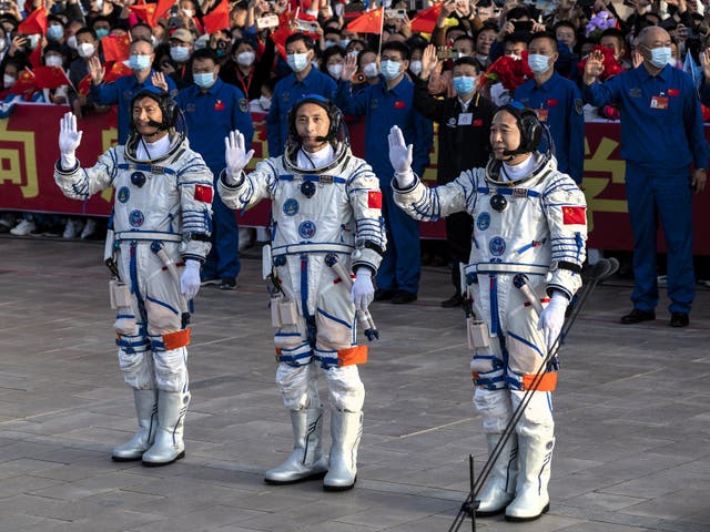 <p>Chinese astronauts and crew of the Shenzhou-16 mission at China’s Manned Space Agency wave to well wishers at a pre-launch departure ceremony on 30 May, 2023 in Jiuquan, China</p>