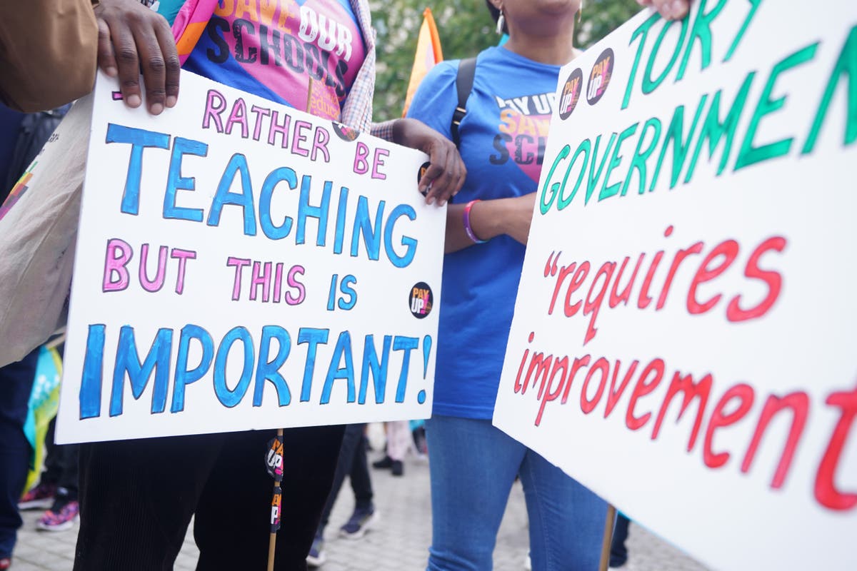 Teachers in England vote for industrial action in autumn term in pay dispute