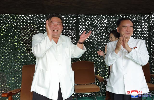 <p>North Korea's leader Kim Jong-un applauding the test firing of a new intercontinental ballistic missile (ICBM) ‘Hwasong-18’ at an undisclosed location in North Korea </p>