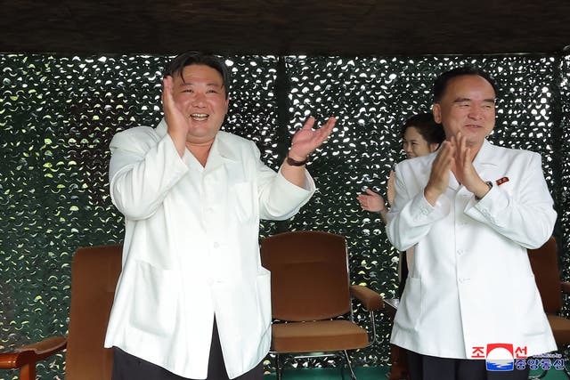<p>North Korea's leader Kim Jong-un applauding the test firing of a new intercontinental ballistic missile (ICBM) ‘Hwasong-18’ at an undisclosed location in North Korea </p>