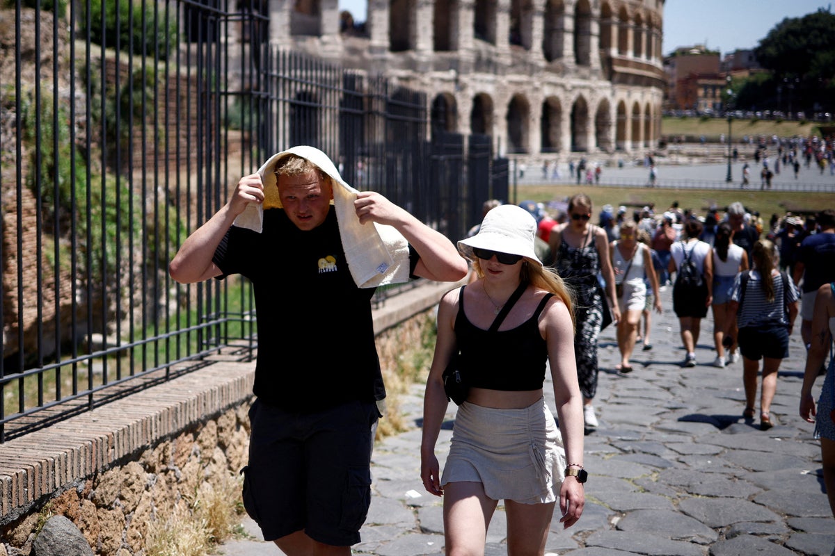 Europe heatwave – live: Deadly heat and severe storms grip continent as Italian cities placed on red alert