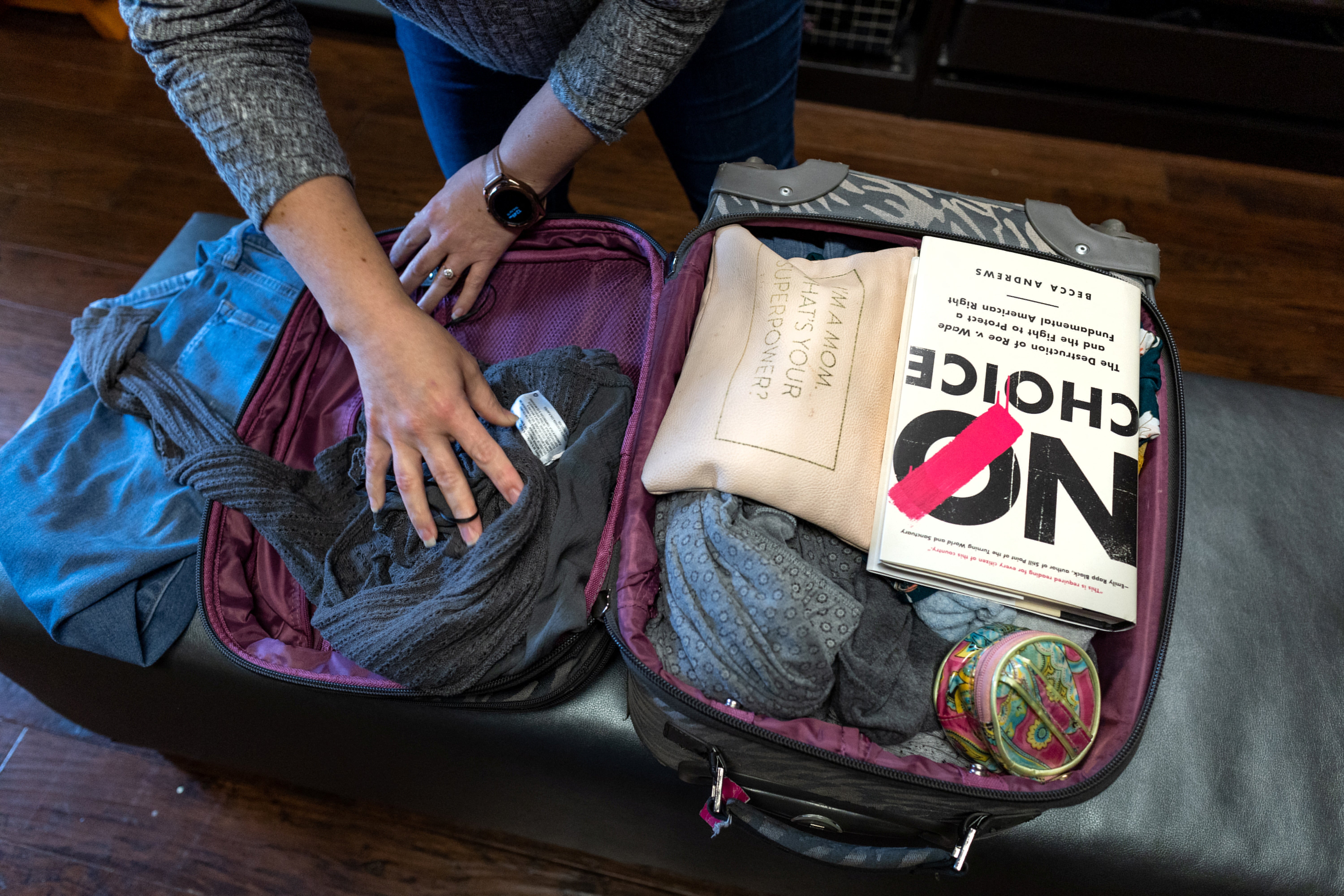 Before flying to spend several days running the Alamo Women’s Clinic in Carbondale, Illinois, Gallegos packs her suitcase at her home in San Antonio, Texas