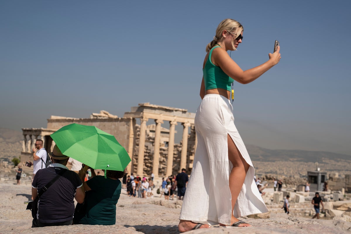 Watch live: Tourists endure high temperatures at Athens Acropolis as heatwave sweeps through Greece