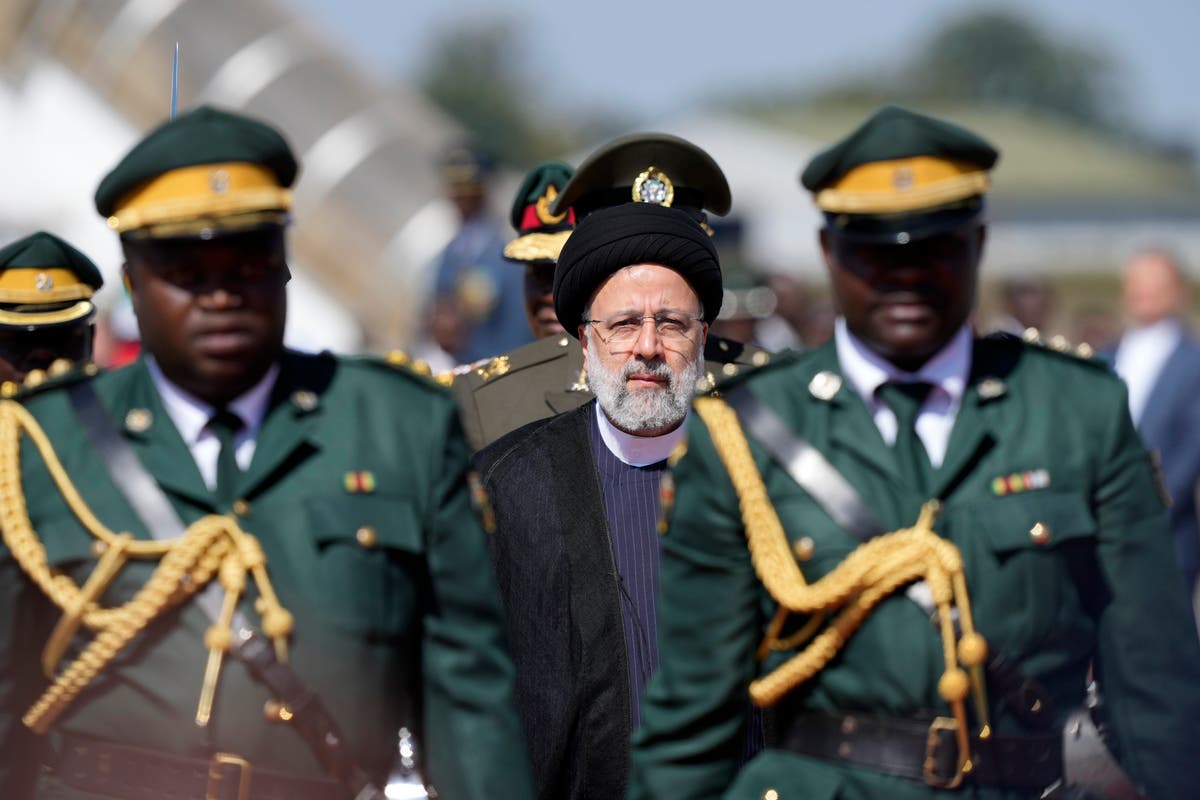 Iranian president arrives in Zimbabwe to anti-West songs for the last stop on a rare Africa trip