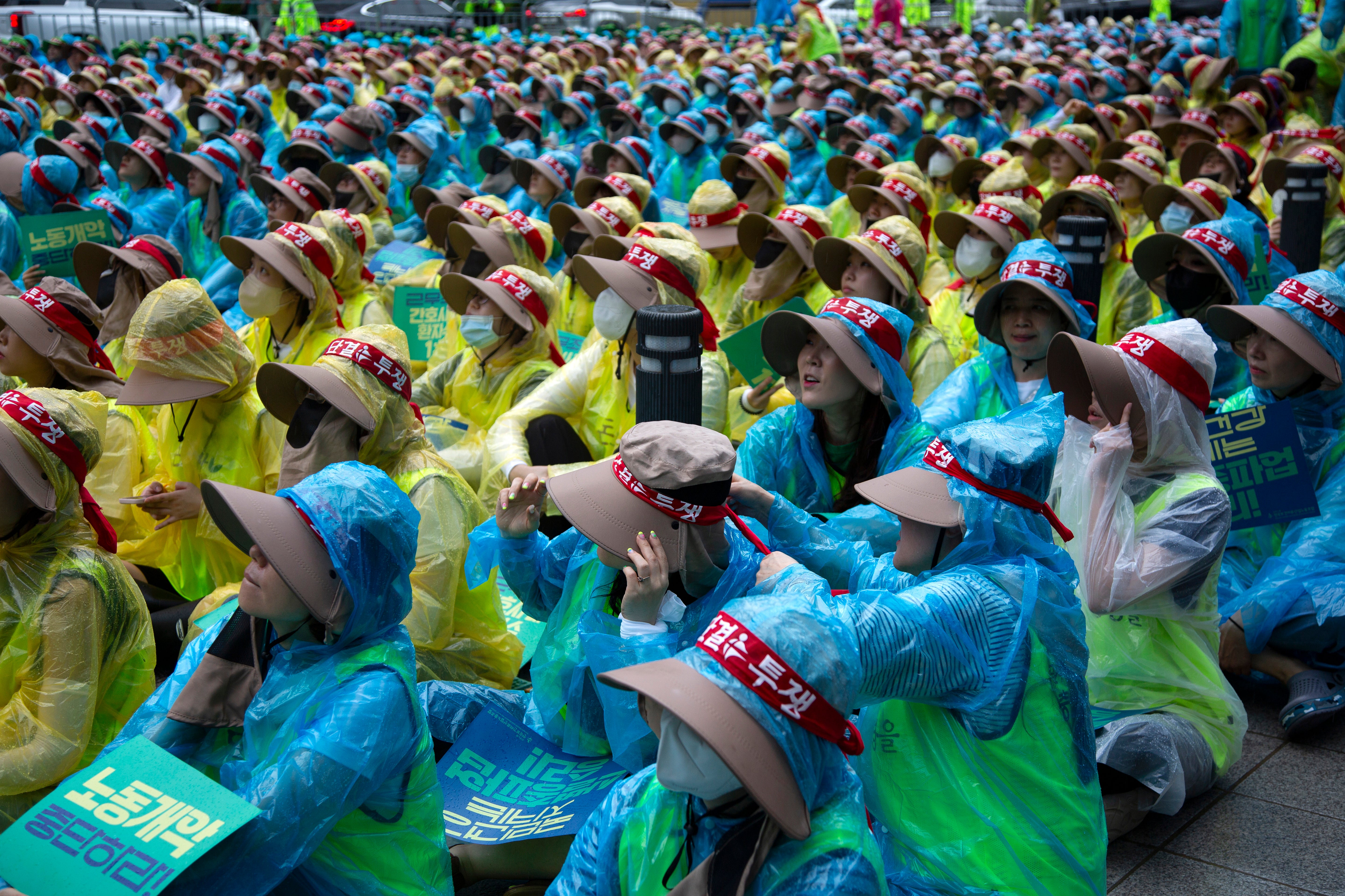 Members of Health and Medical Workers' Unions gather during a rally against the government's Labor Policy in Seoul, South Korea, 13 July 2023. The South Korean Confederation of Trade Unions (KCTU) began a general strike on a national scale from 03 July against the Government's labor policy.