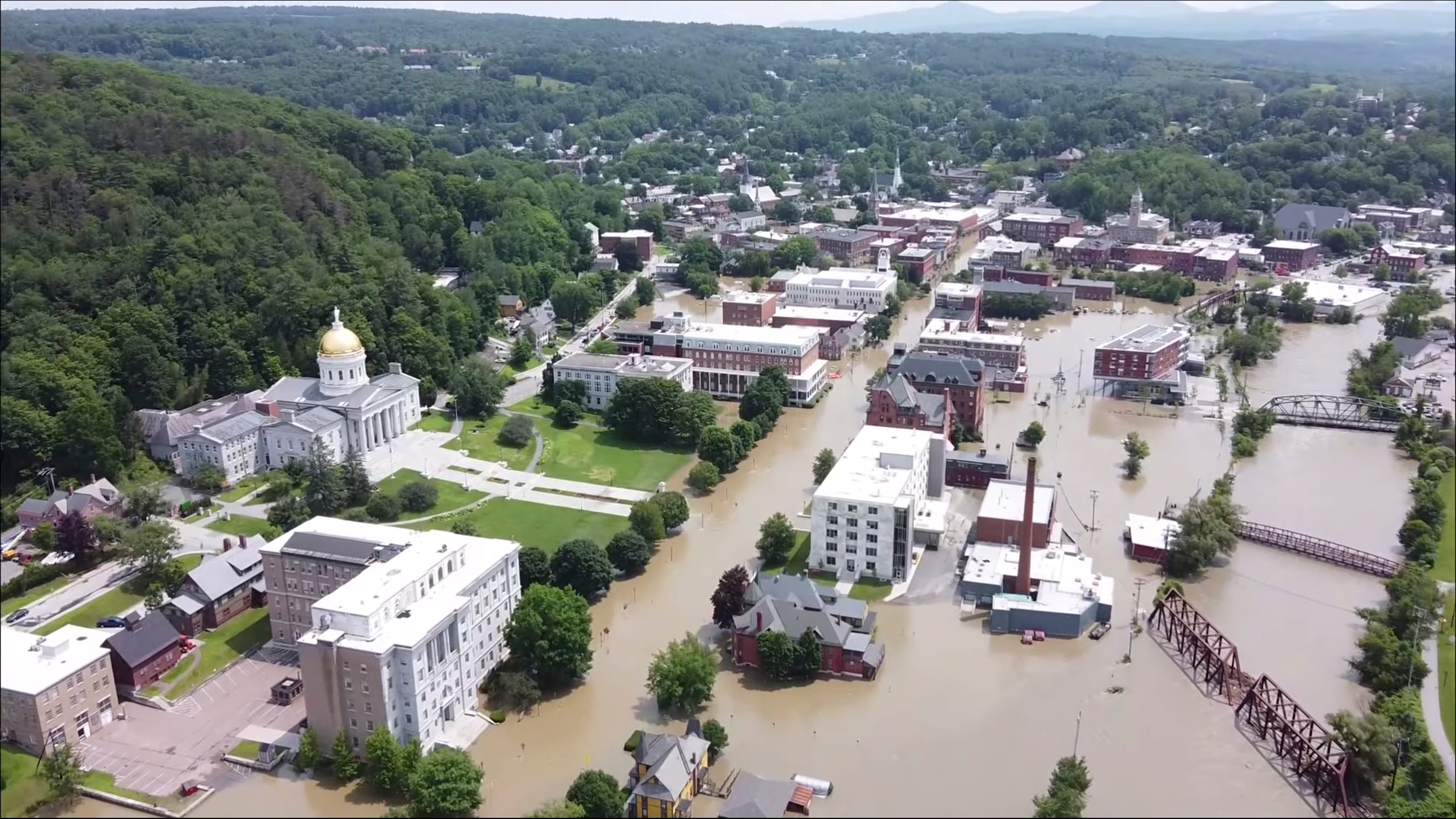 This image made from drone footage provided by the Vermont Agency of Agriculture, Food and Markets shows flooding in Montpelier