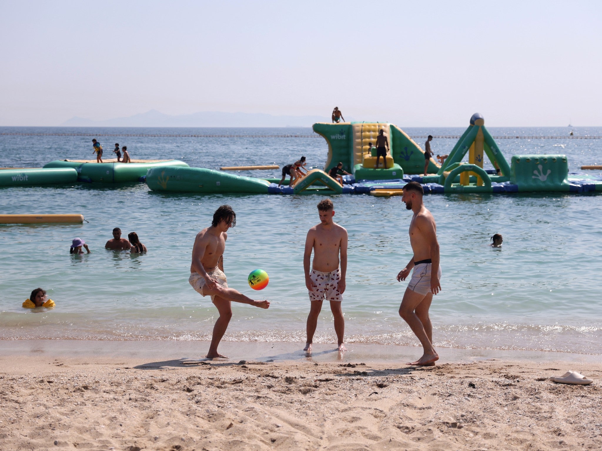 Holidaymakers on Alimos beach, near Athens