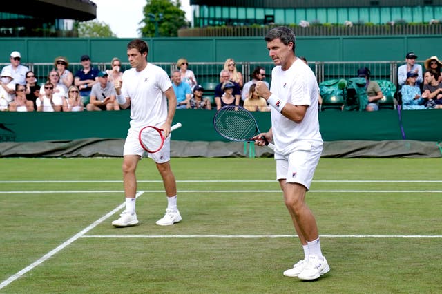 Ken Skupski, right, is now his younger brother Neal’s coach (John Walton/PA)