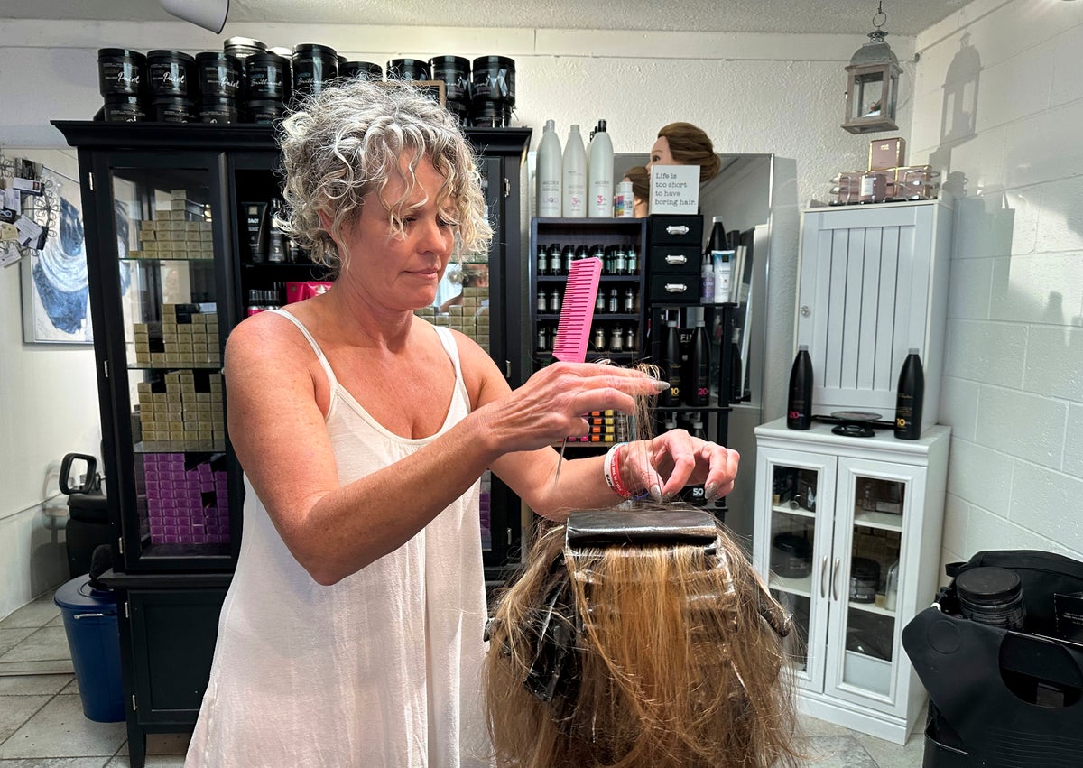 Michigan city investigates salon owner's online comments about gender identity