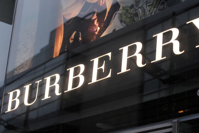 Luxury fashion brand Burberry has seen its sales spike in recent months (Anna Gowthorpe/PA)