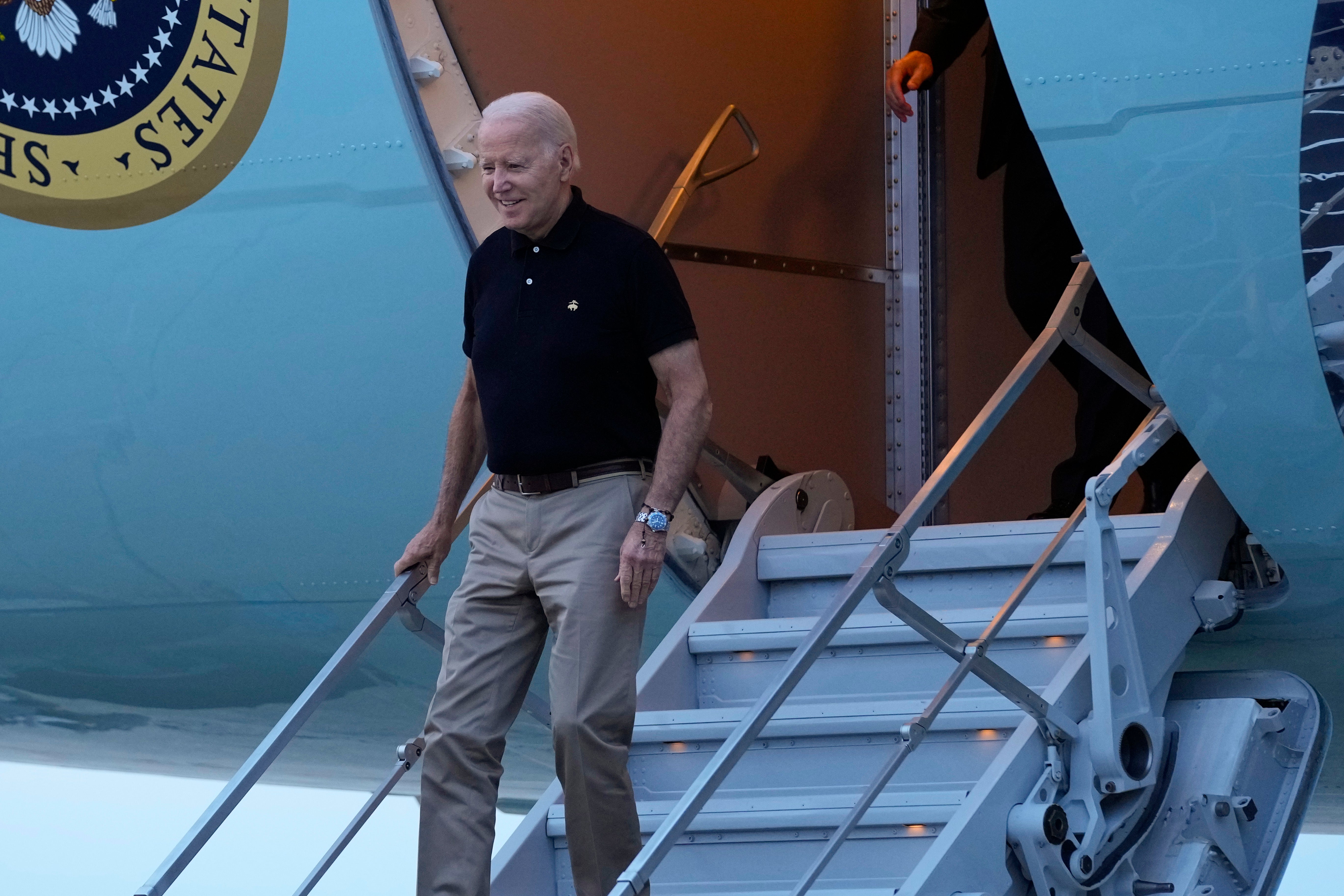 President Joe Biden walks down the steps of Air Force One at Andrews Air Force Base, Maryland, on Thursday, July 13, 2023.