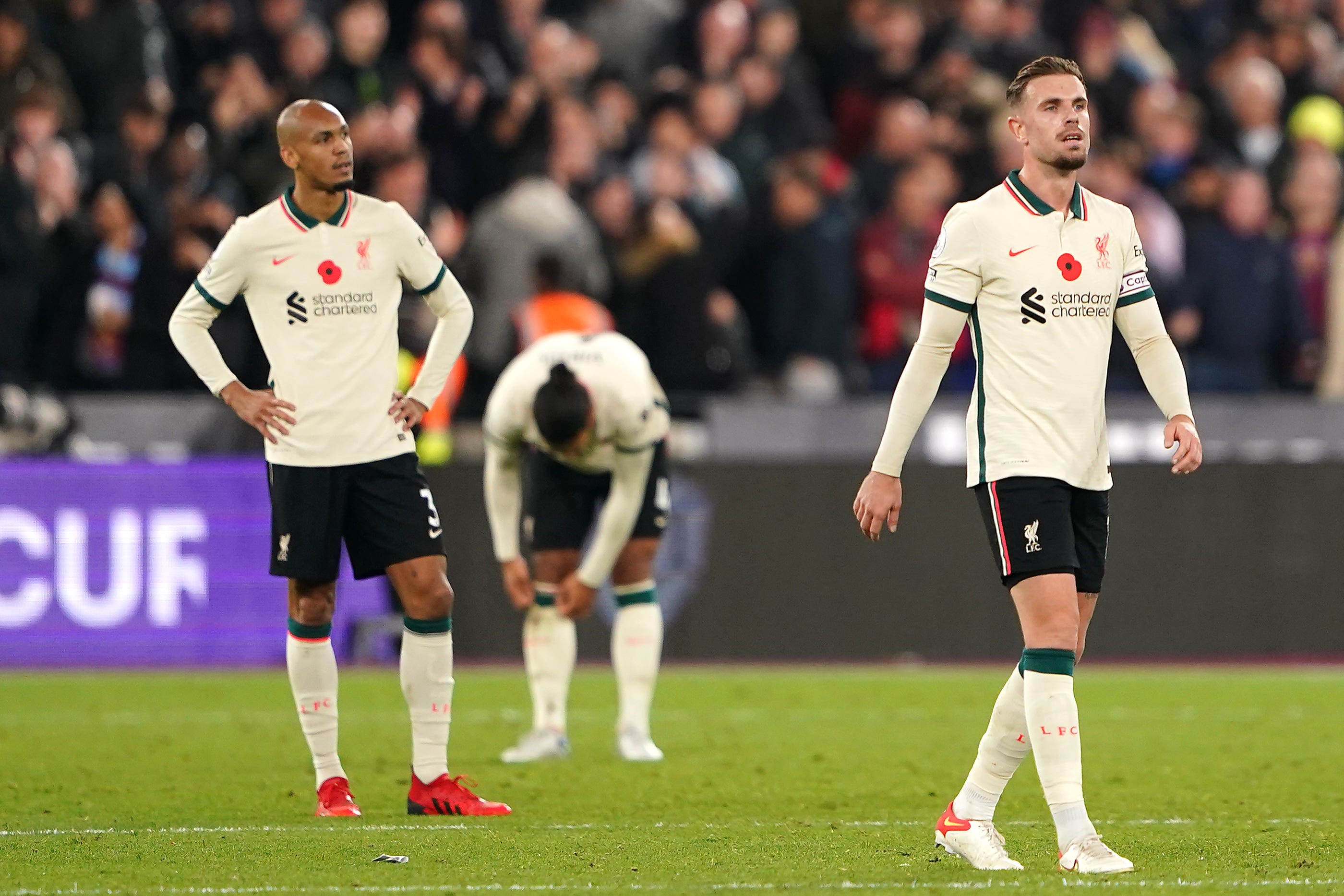 Liverpool have yet to receive any bids for midfielders Fabinho and Jordan Henderson (right) despite fevered speculation linking both to Saudi Arabian clubs (Zac Goodwin/PA)