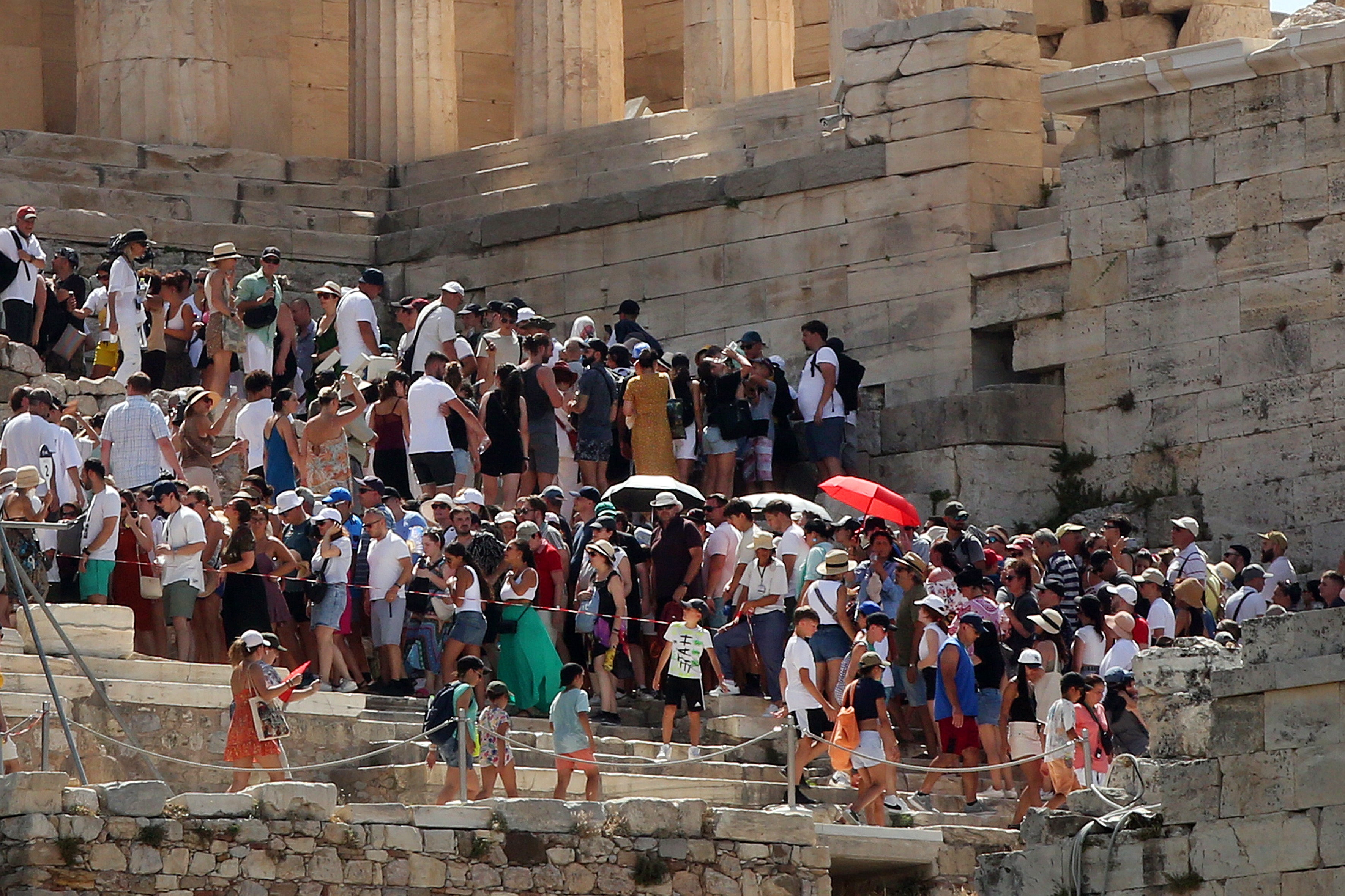 <p>Tourists were forced to leave the Acropolis in Athens, Greece, which closed at midday today due to high temperatures</p>