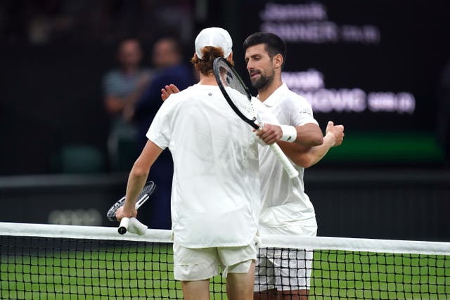 Novak Djokovic consoles Jannik Sinner at the net following his victory in the Gentlemen’s Singles semi-final match on day twelve of the 2023 Wimbledon Championships at the All England Lawn Tennis and Croquet Club in Wimbledon. Picture date: Friday July 14, 2023.