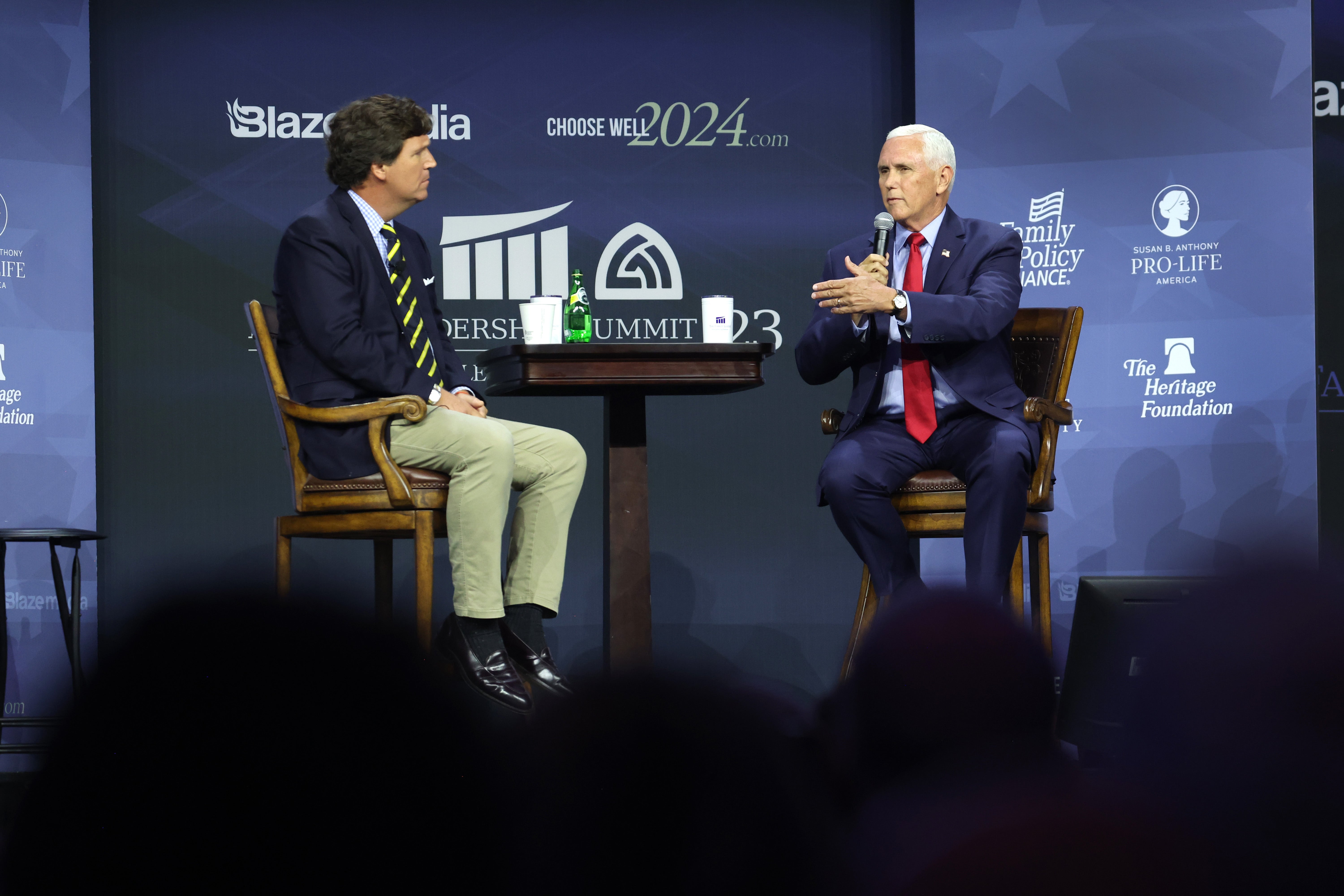 Mike Pence fields questions from former Fox News host Tucker Carlson at the at the Family Leadership Summit in Des Moines, Iowa