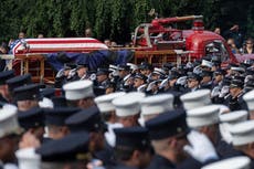 Firefighter killed while battling cargo ship fire is posthumously promoted during funeral