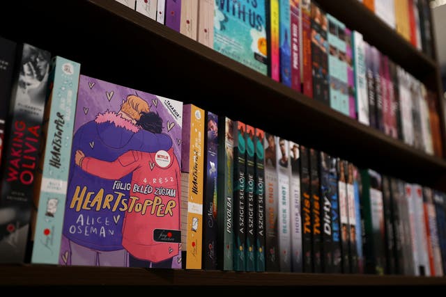 <p>A copy of Alice Oseman’s ‘Heartstopper’ is displayed in Lira in Budapest</p>