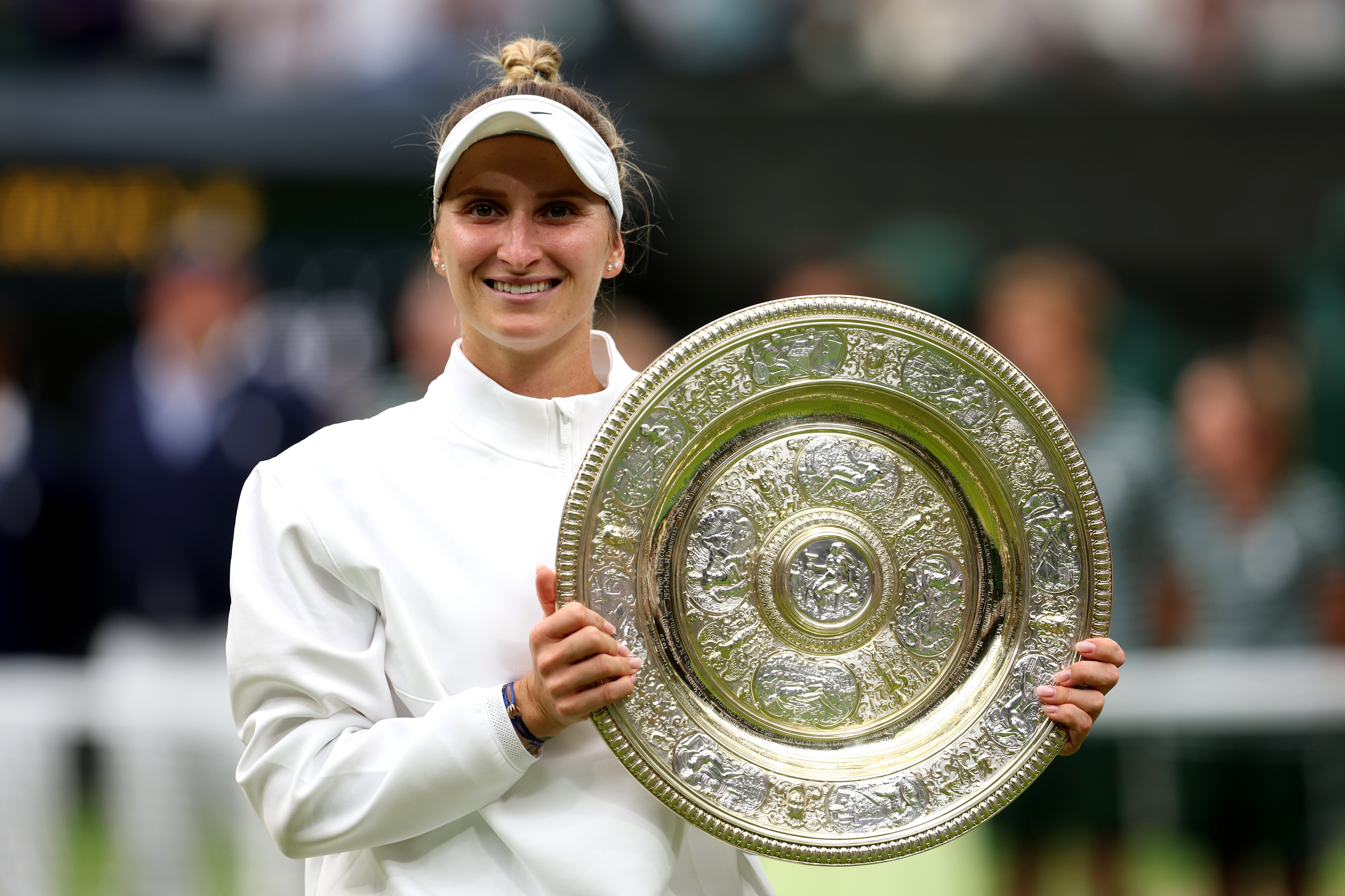 Marketa Vondrousova becomes the first unseeded woman to win the singles title at Wimbledon