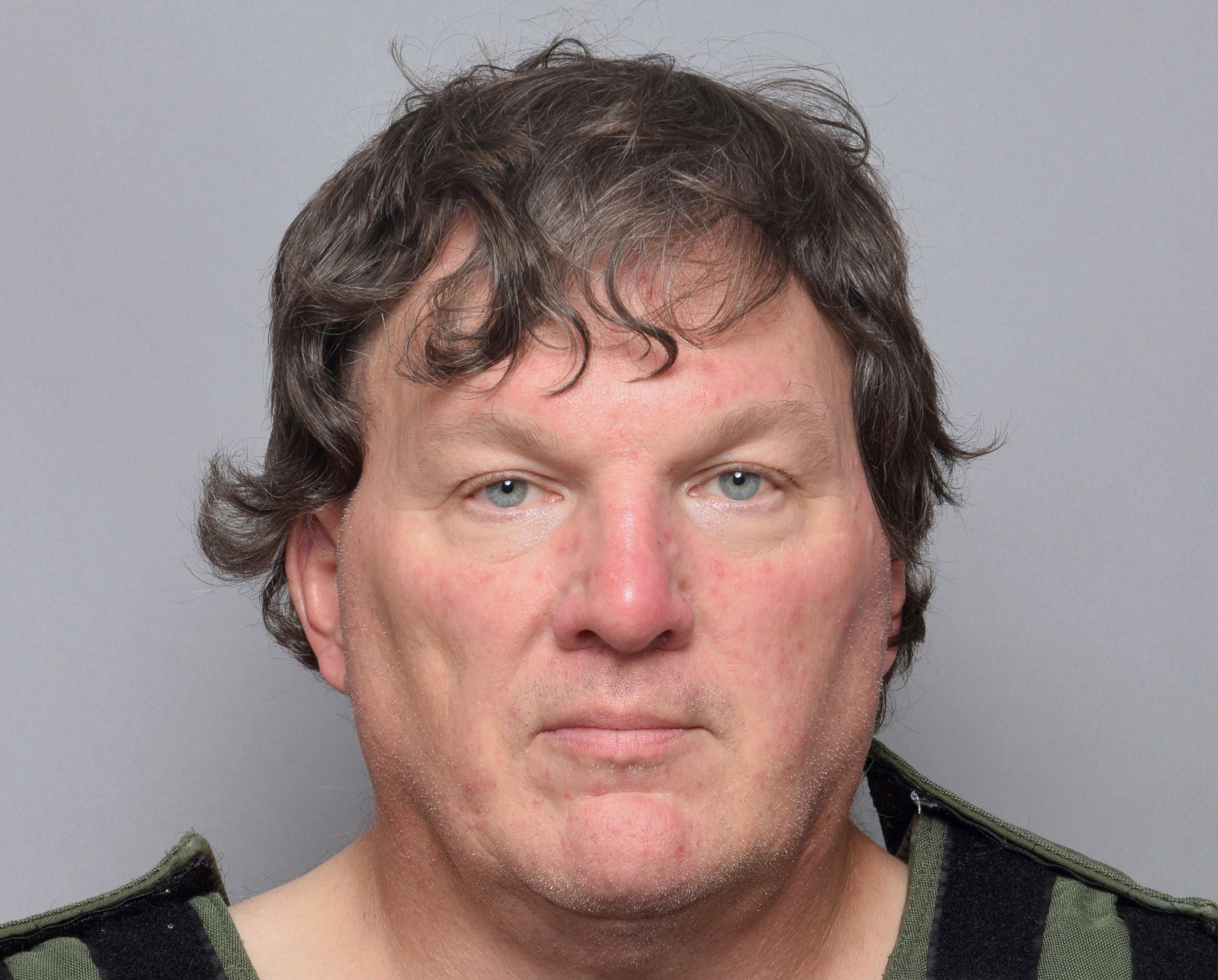 This booking image provided by Suffolk County Sheriffâs Office, shows Rex Heuermann, a Long Island architect who was charged Friday, July 14, 2023, with murder in the deaths of three of the 11 victims in a long-unsolved string of killings known as the Gilgo Beach murders.