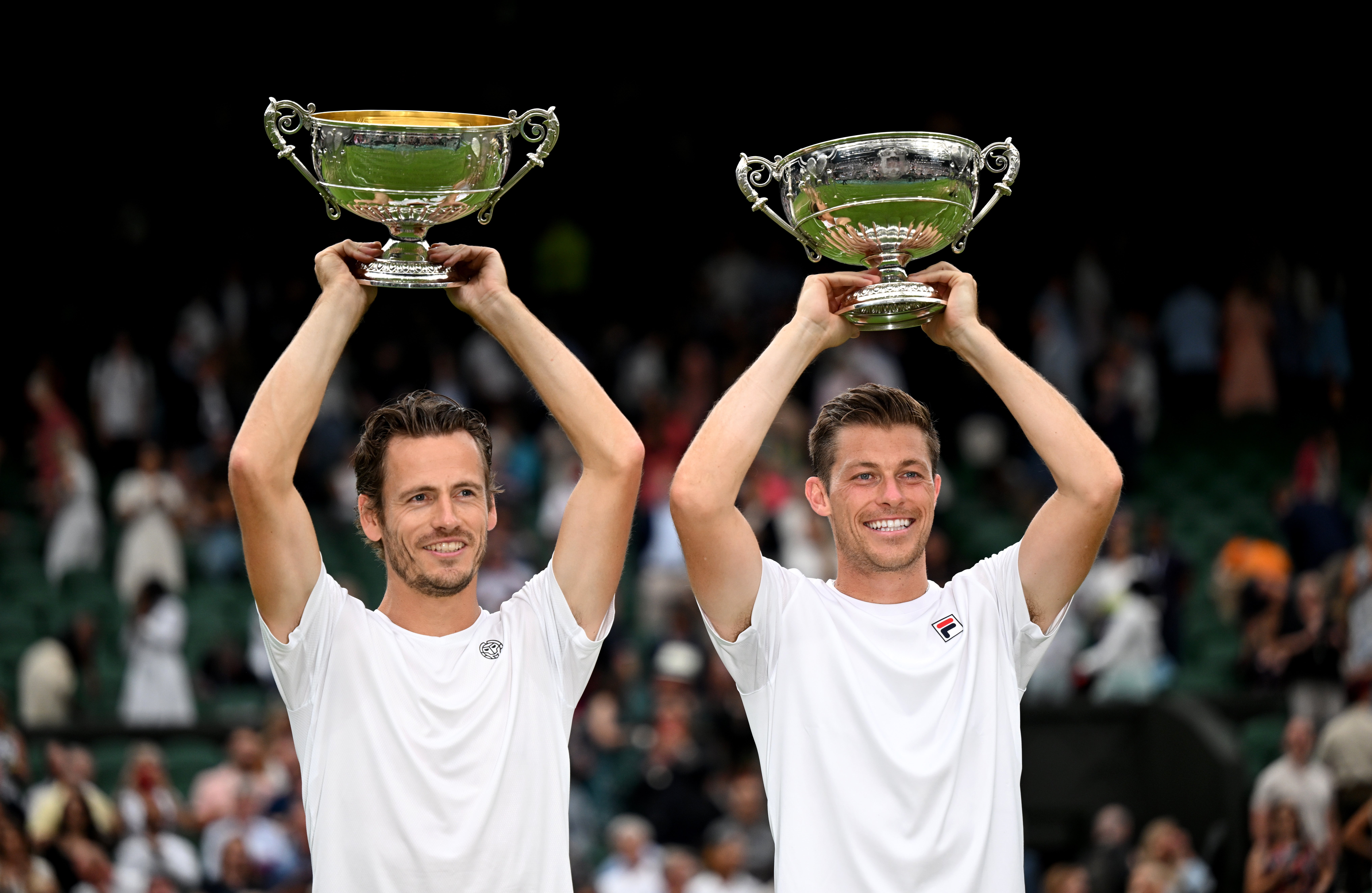 Neal Skupski (R) claimed his first Grand Slam men’s doubles title with victory at Wimbledon with Dutch partner Wesley Koolhof (L)