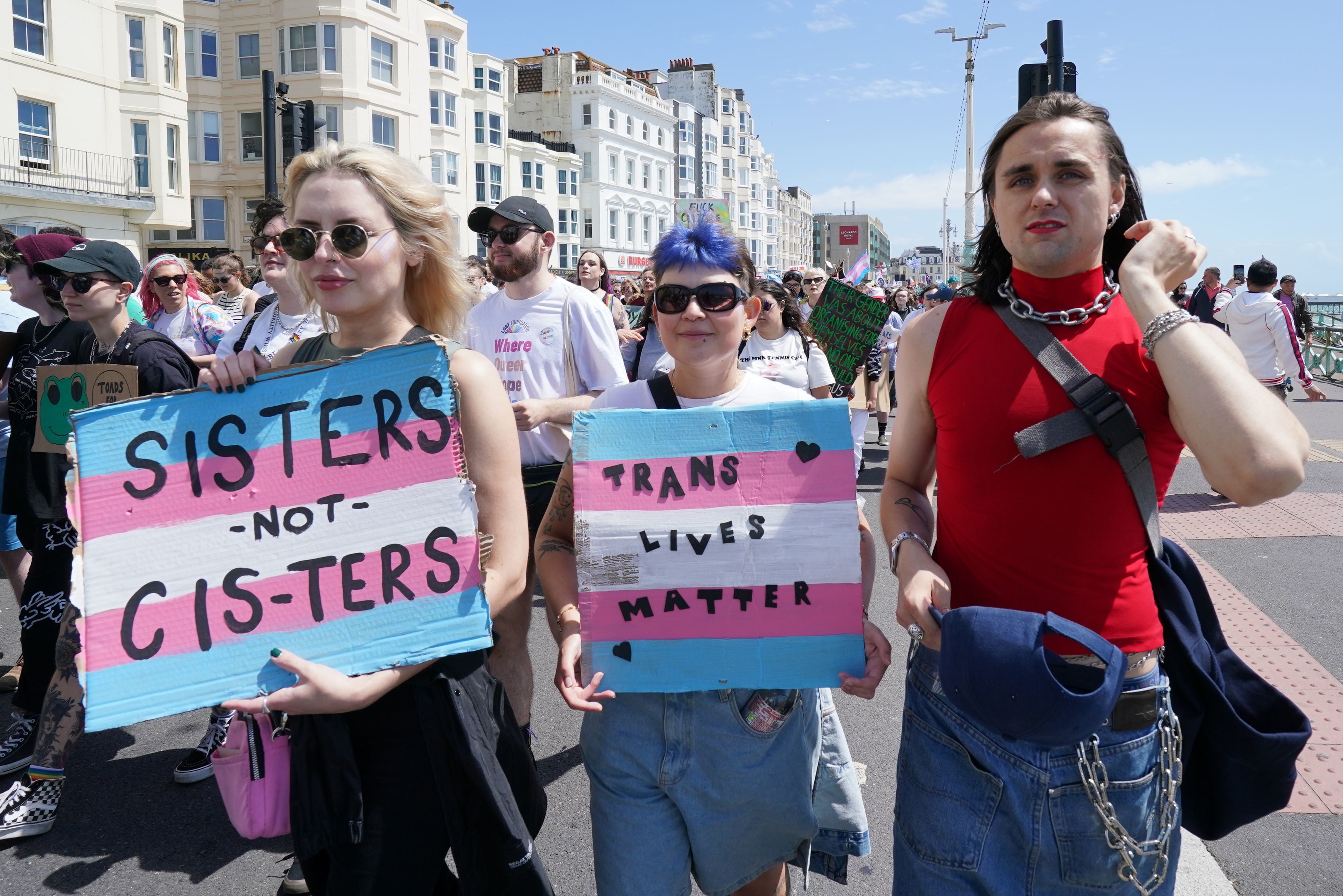 People take part in a Trans Pride protest march in Brighton
