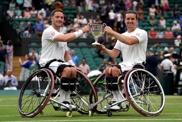 Alfie Hewett and Gordon Reid celebrate victory over Takuya Miki and Tokito Oda (Victoria Jones/PA)