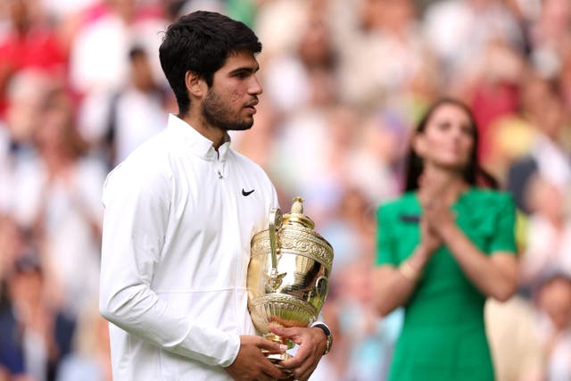 Carlos Alcaraz with his Wimbledon trophy (Steven Paston/PA)
