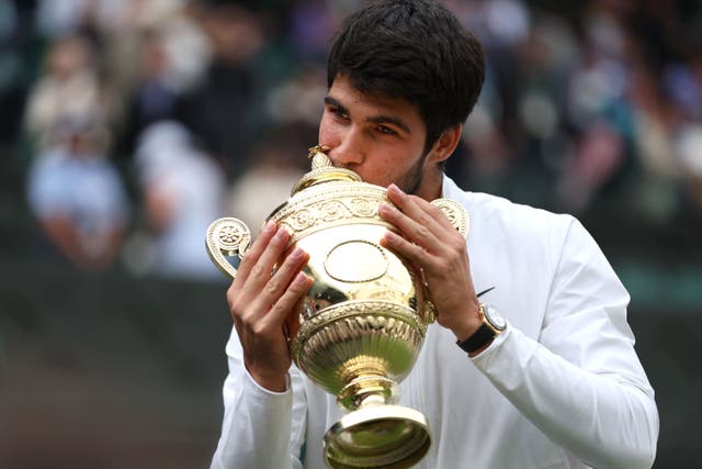 Carlos Alcaraz was crowned men’s singles champion at Wimbledon with an epic victory over Novak Djokovic (Steven Paston/PA)
