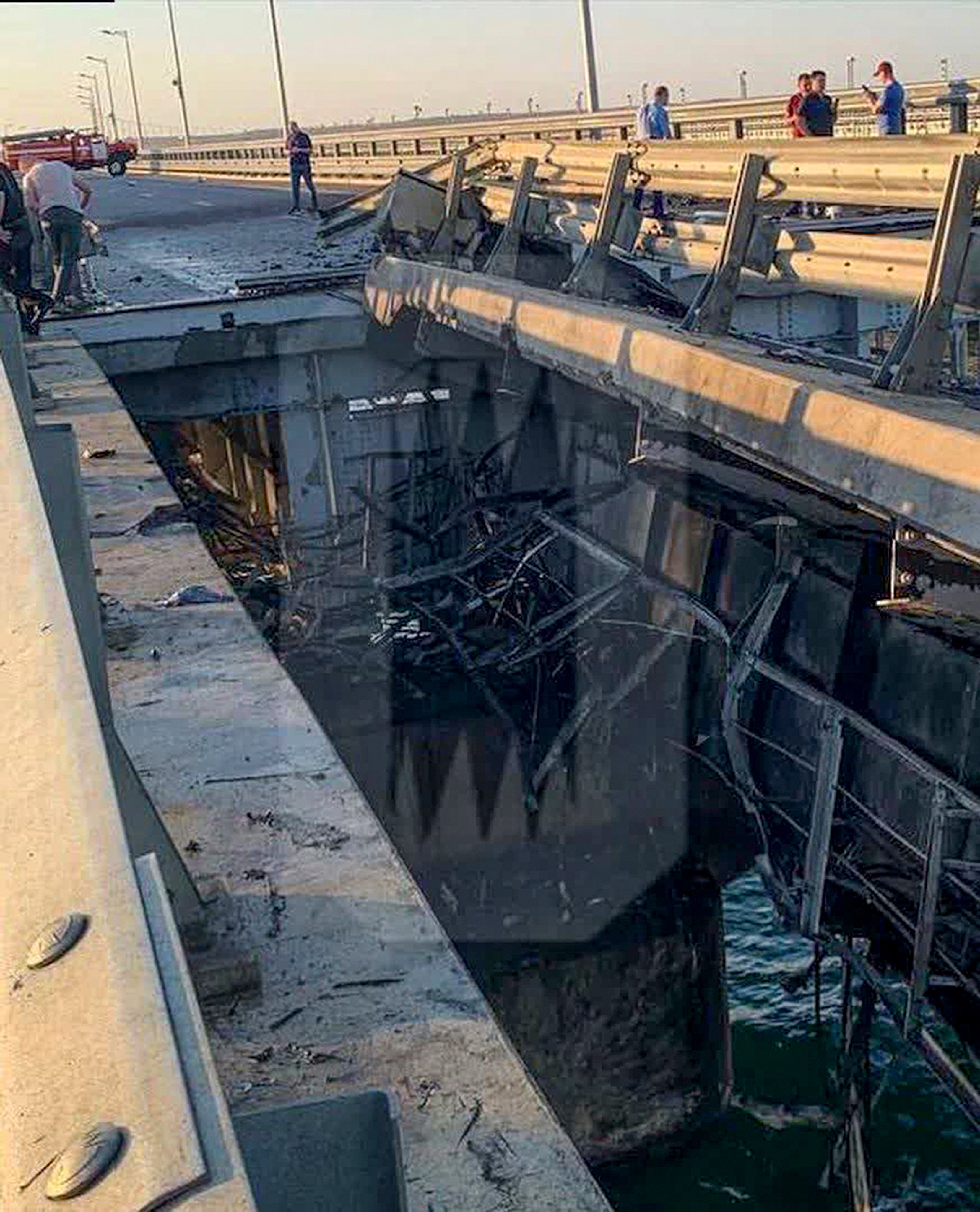 Damaged parts reportedly of an automobile link of the Crimean Bridge connecting Russian mainland and Crimean peninsula over the Kerch Strait not far from Kerch, Crimea