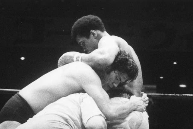 <p>Muhammad Ali (top) fighting wrestler and martial artist Antonio Inoki in 1976</p>