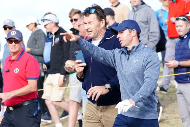 Sir Nick Faldo, left, wants Rory McIlroy to act as if he ‘owns the ring’ as he bids to win a second Open title at Royal Liverpool (Jane Barlow/PA)