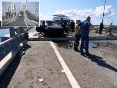 Ukraine war – live: Russia says traffic partially restored on Crimea bridge as furious Putin vows revenge