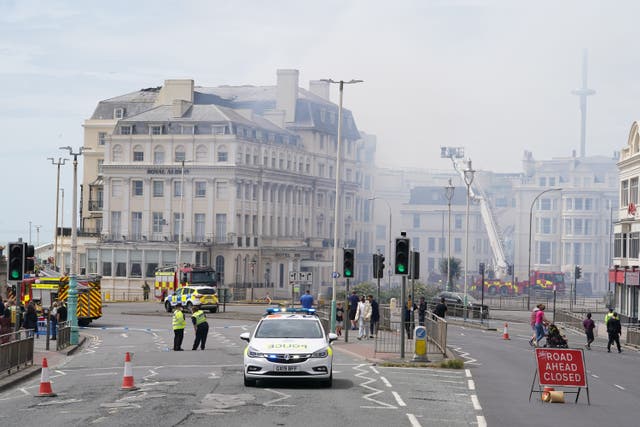 Efforts to extinguish the fire at the Royal Albion Hotel were hampered by high winds (Gareth Fuller/PA)