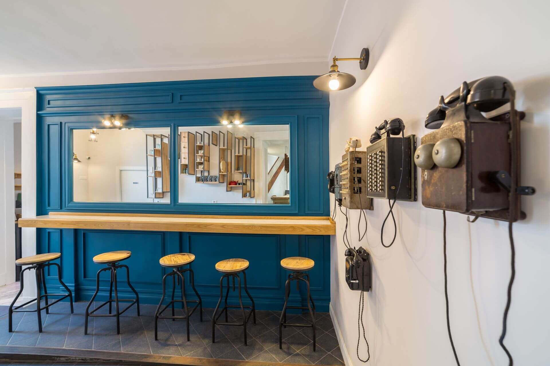 Quirky touches such as old telephones decorate the communal space
