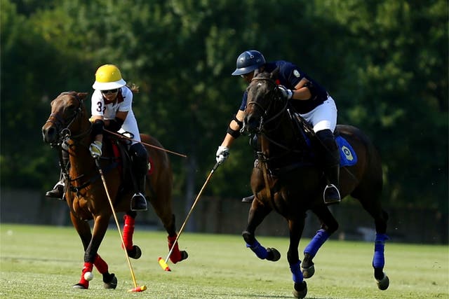 <p>Polo enthusiasts battle for the ball at Tianjin season opening tournament in June, 2023</p>