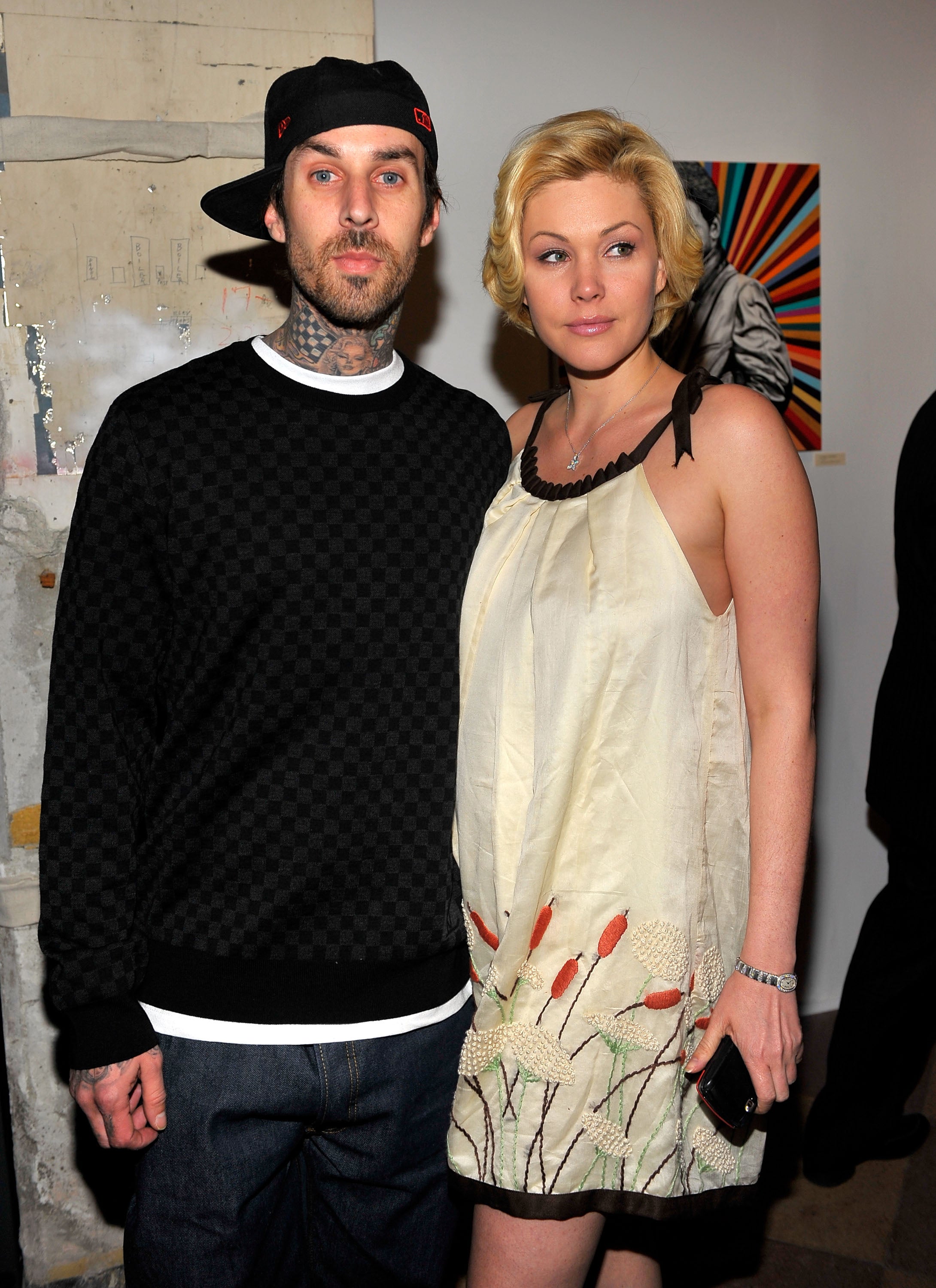 Travis Barker and Shanna Moakler attend the launch of Worlds on Fire: Grammy-Nominated Artist Exhibition at Pacific Electric Lofts on February 2, 2009