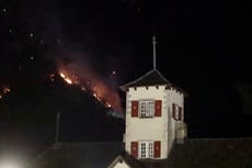 Wildfires burn overnight in Switzerland as police evacuate villages