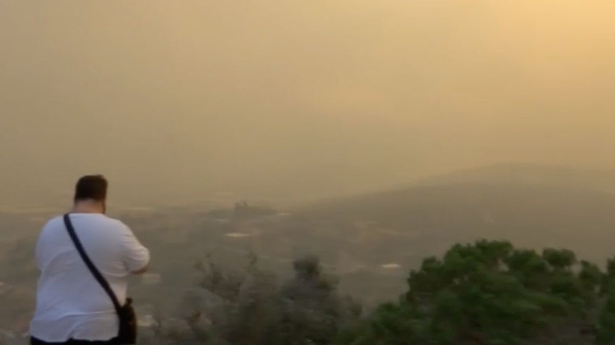 Watch live as smoke rises from intensifying wildfires north of Athens