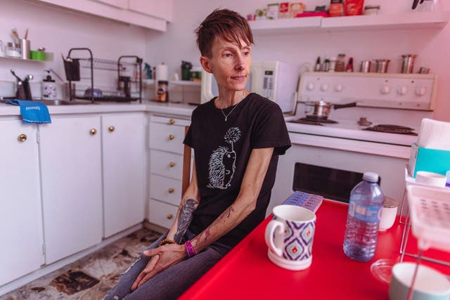 <p>Lisa Pauli, 47, who says she wants to apply for medical assistance in dying (MAiD) when she is eligible because of her severe anorexia, sits on a chair, in Toronto, Ontario, Canada June 9, 2023.  REUTERS/Carlos Osorio</p>