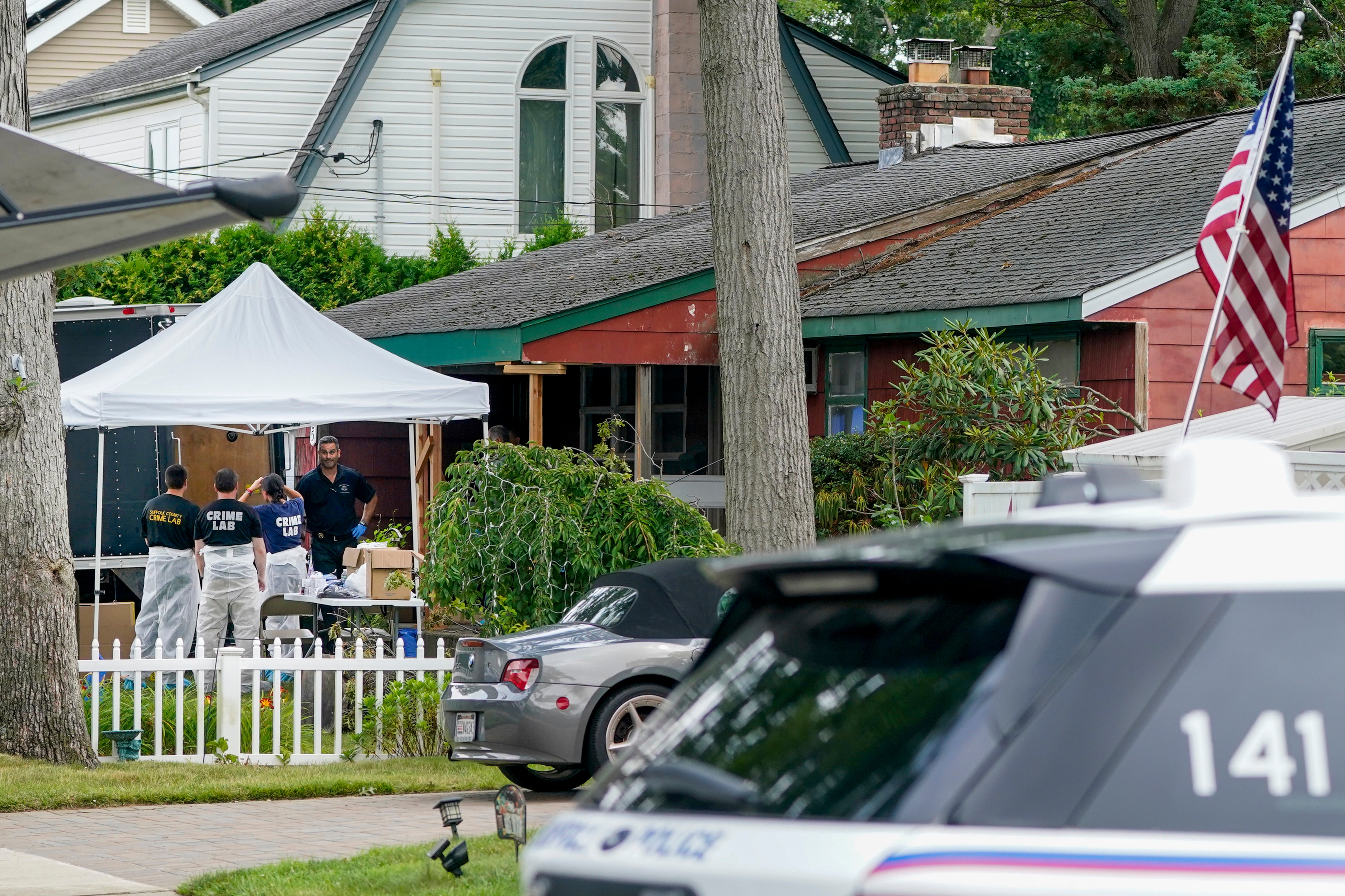 Authorities search the home of suspect Rex Heuermann on Tuesday