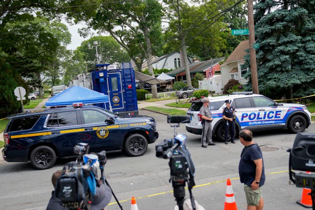 <p>Authorities search the home of suspect Rex Heuermann, Tuesday, 18 July  2023, in Massapequa Park, New york </p>