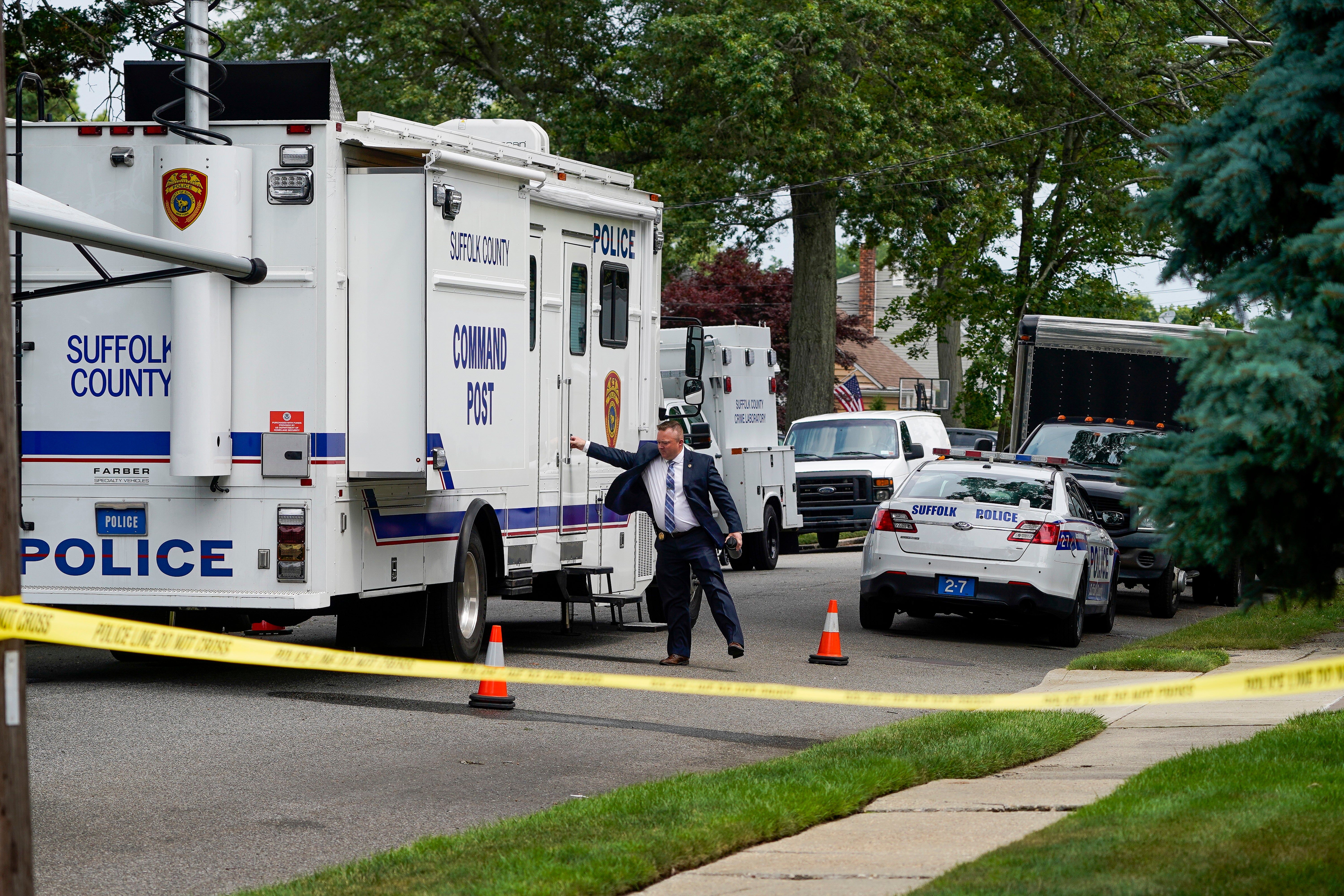 Authorities search the Massapequa home of suspect Rex Heuermann