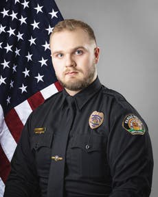 Fargo officer wounded in fatal shooting while responding to crash to leave hospital