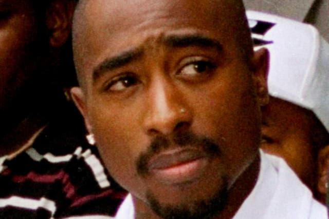 <p>Las Vegas police raided a home in connection with the unsolved murder of Tupac Shakur in 1996 </p>