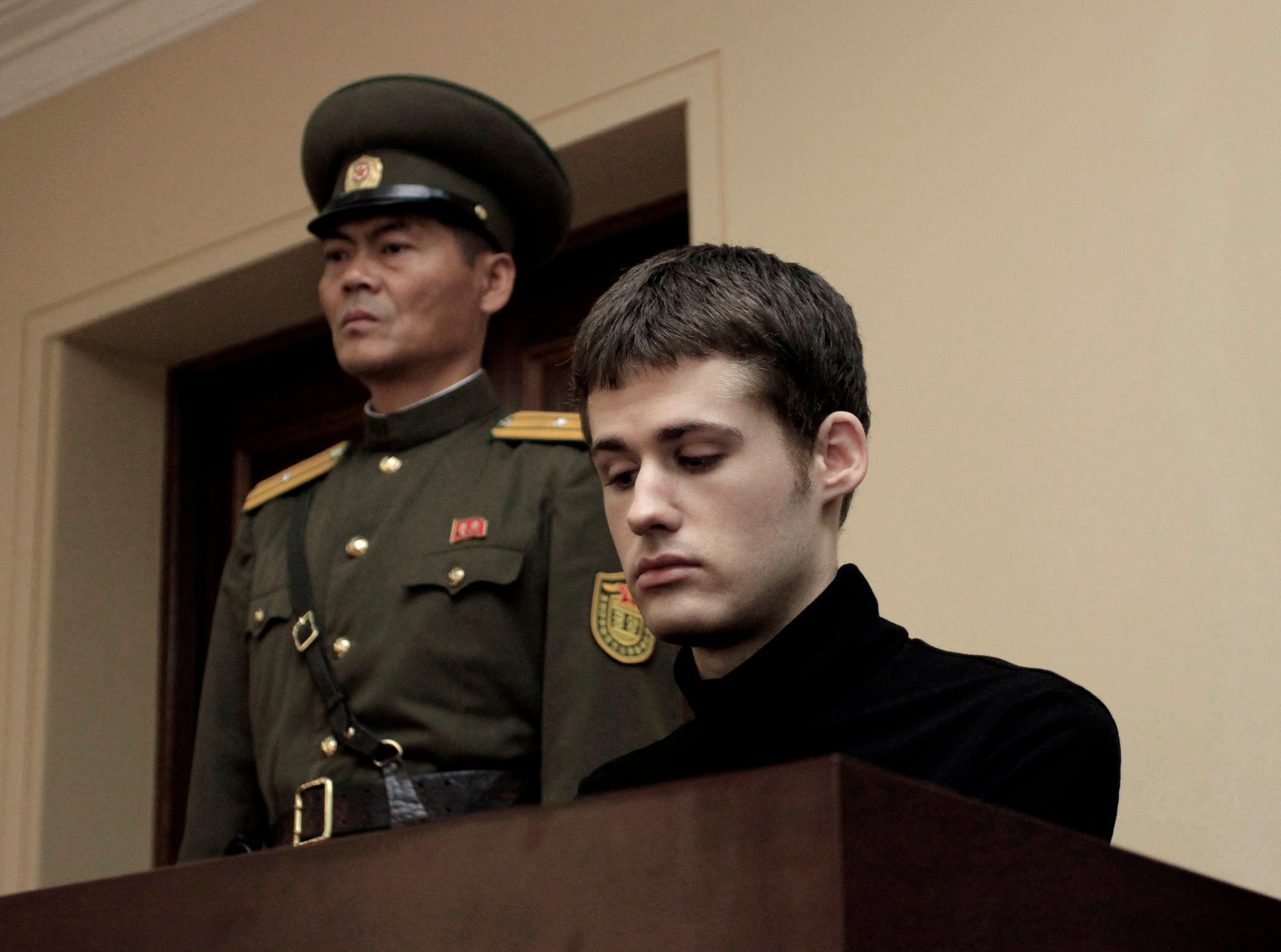 Matthew Miller, a US citizen, sits on the dock at the Supreme Court during his trial in Pyongyang in September 2014