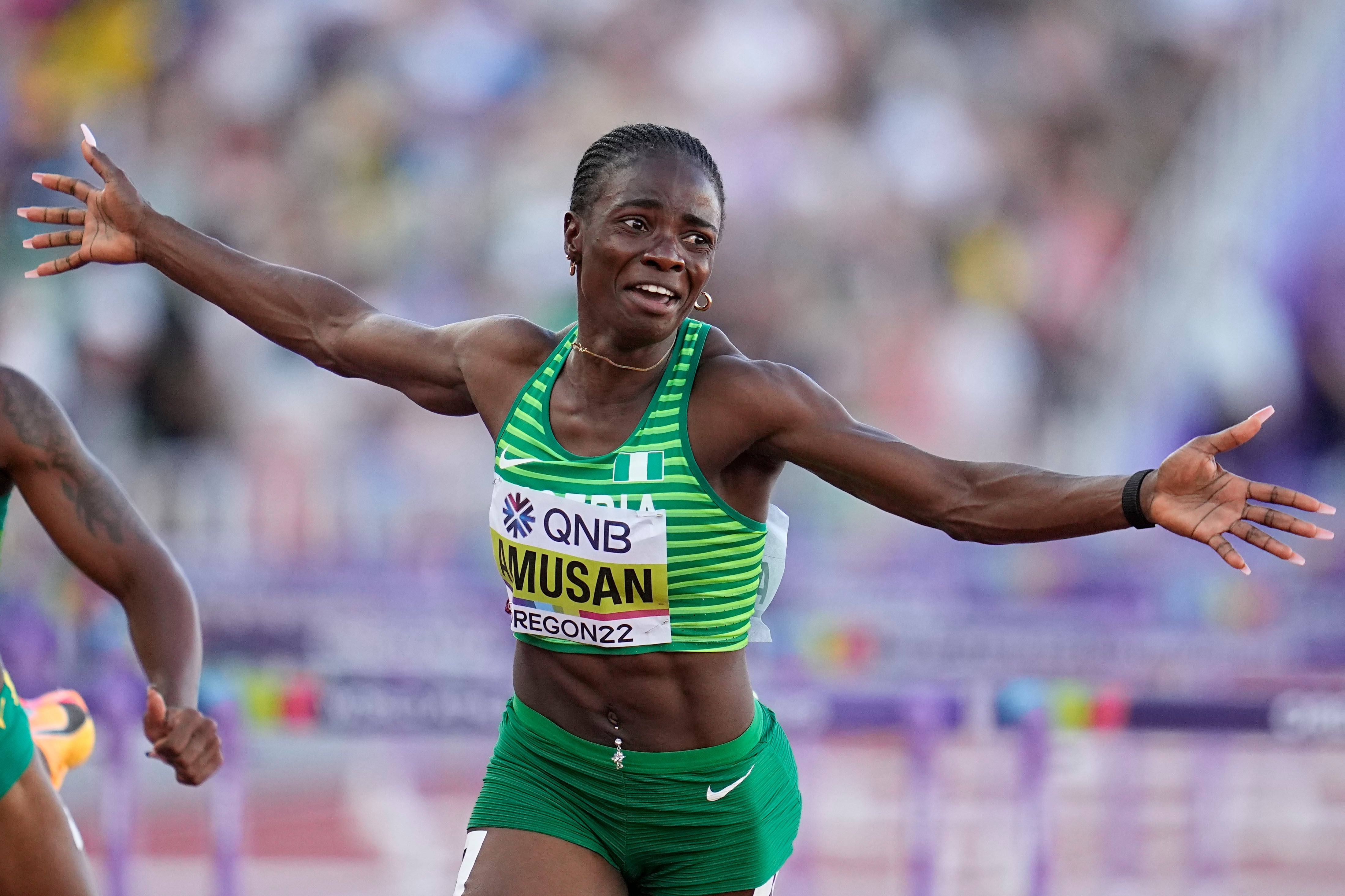 Tobi Amusan celebrates after clinching world gold in Eugene last year