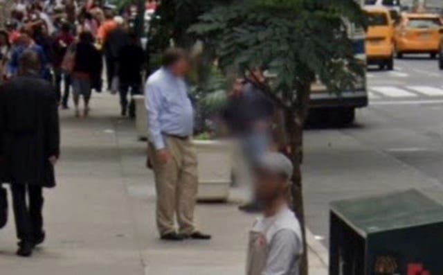<p>Google street view image appears to show Rex Heuermann chatting to a woman near his office</p>