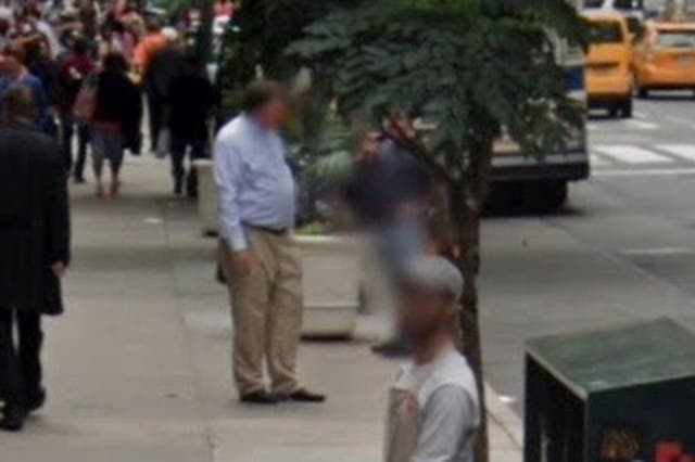<p>Google street view image appears to show Rex Heuermann chatting to a woman near his office</p>